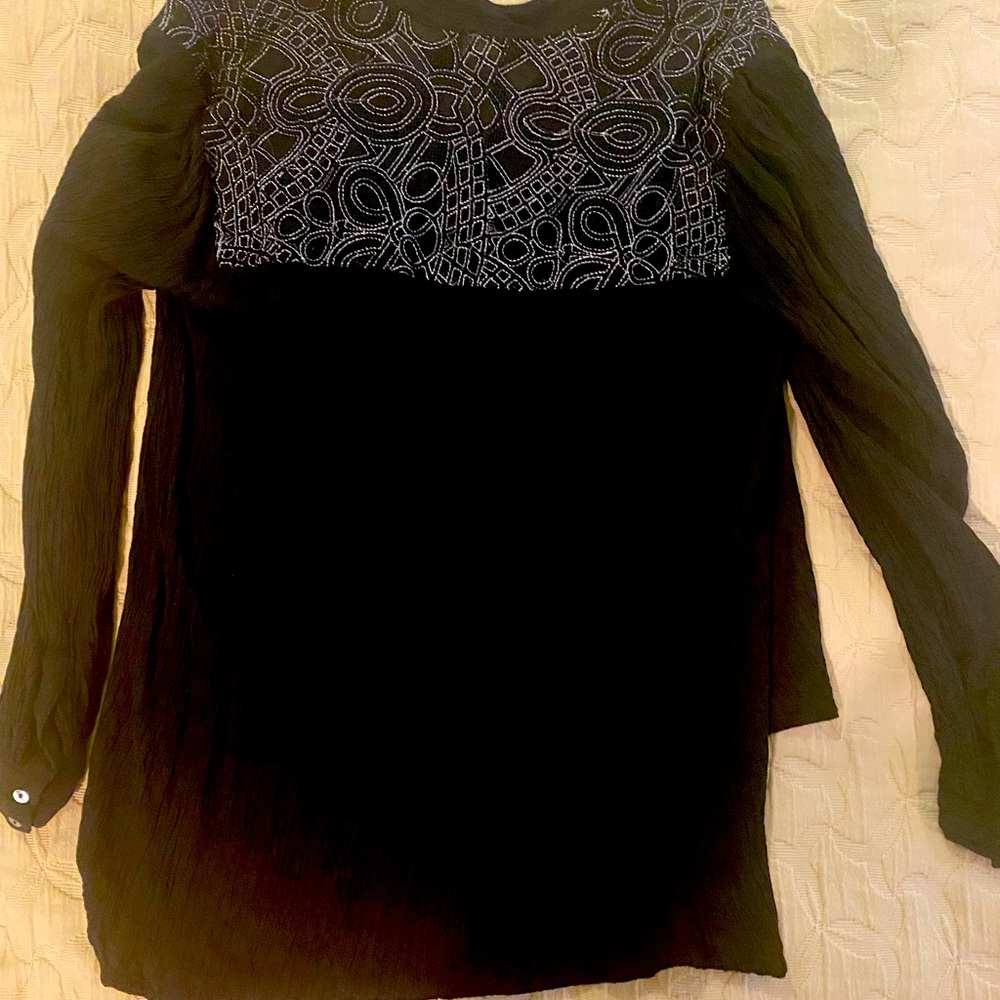Free people black top with silver.
